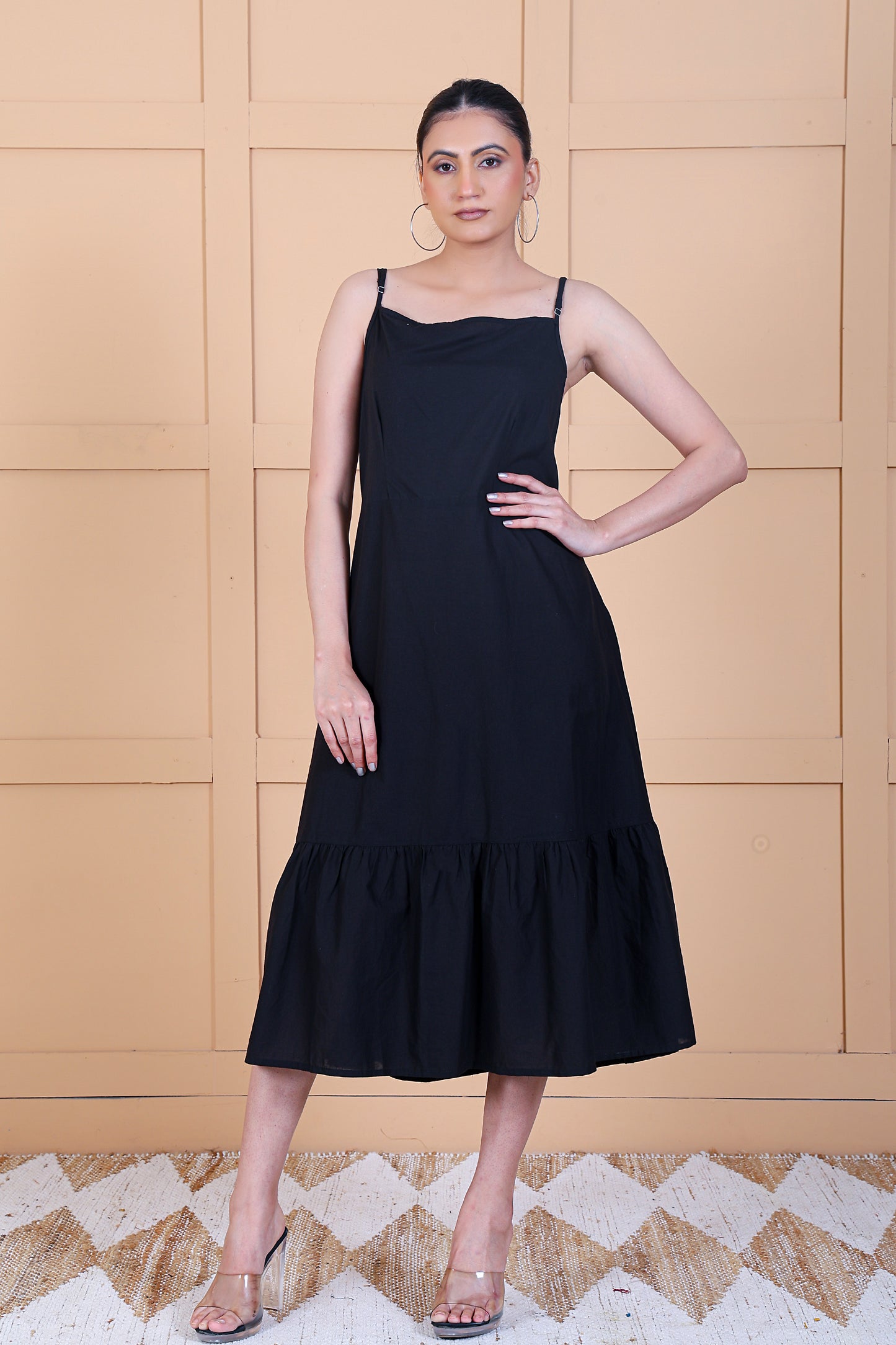 Luxe Sleeve Less Black Solid Tier Dress