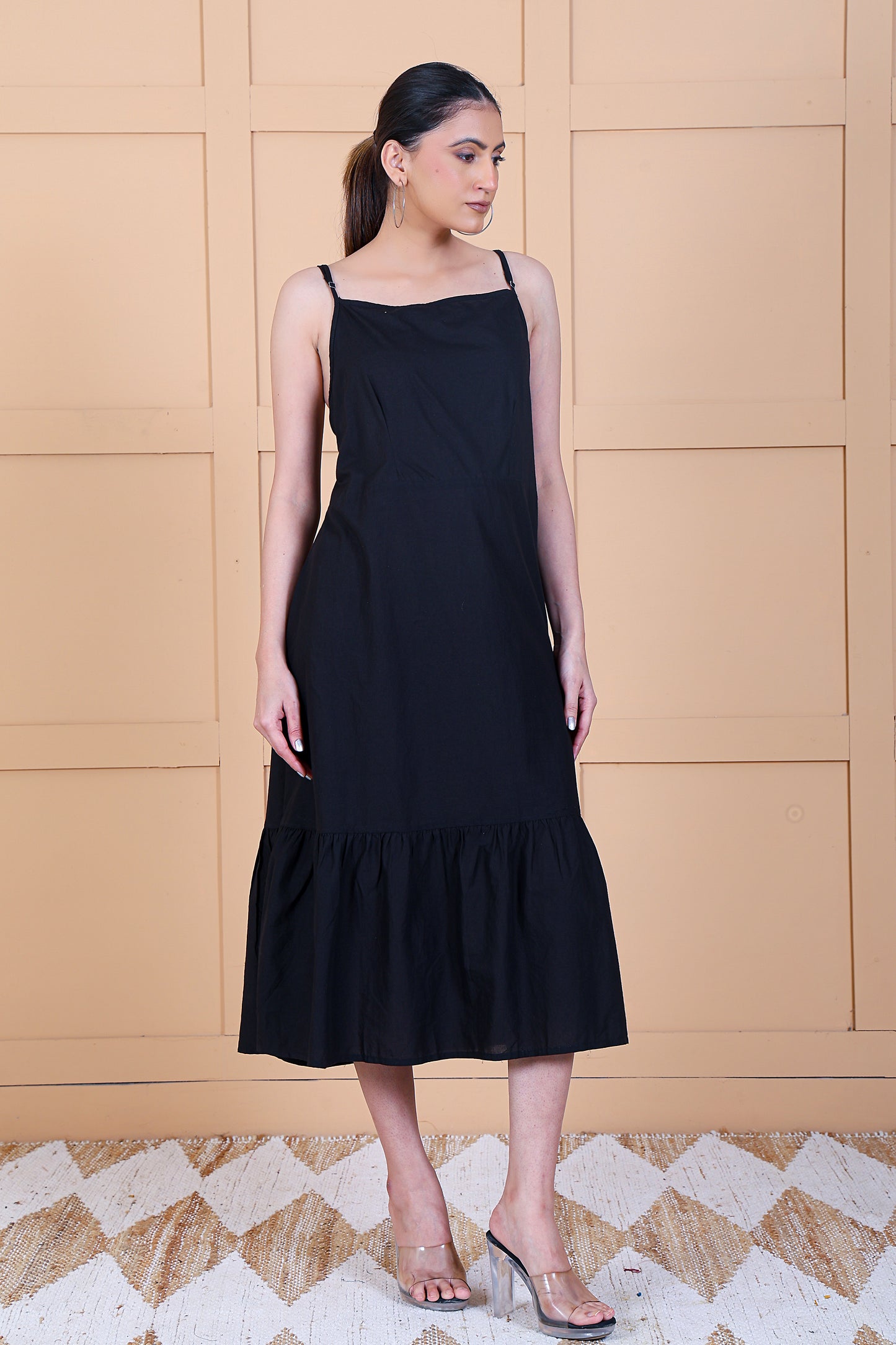 Luxe Sleeve Less Black Solid Tier Dress
